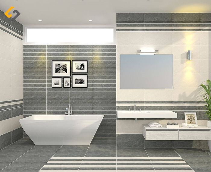 Phòng tắm trở nên ấm cúng với gạch ốp tường màu ánh vàng, kết hợp với ánh đèn phản chiếu tạo nên không gian hoàn hảo.