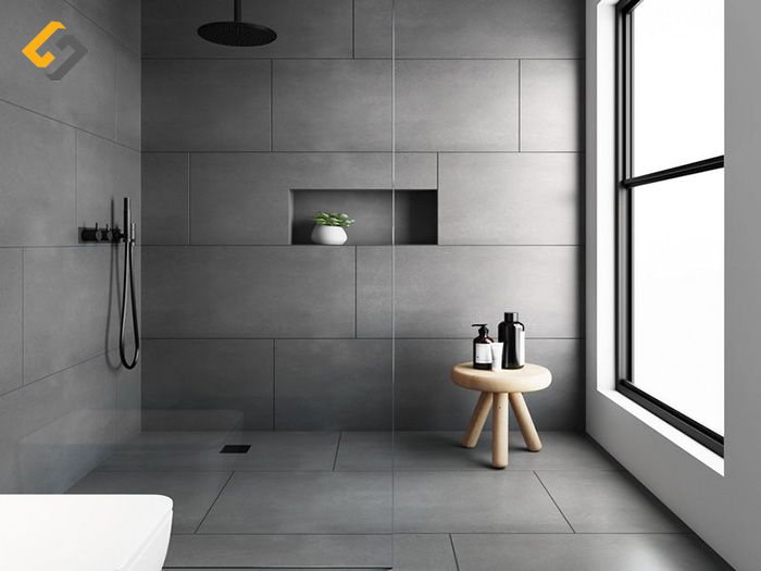 Gạch ốp với gam màu xám đen tạo nên khu vực nhà tắm trở nên nhẹn nhàng
